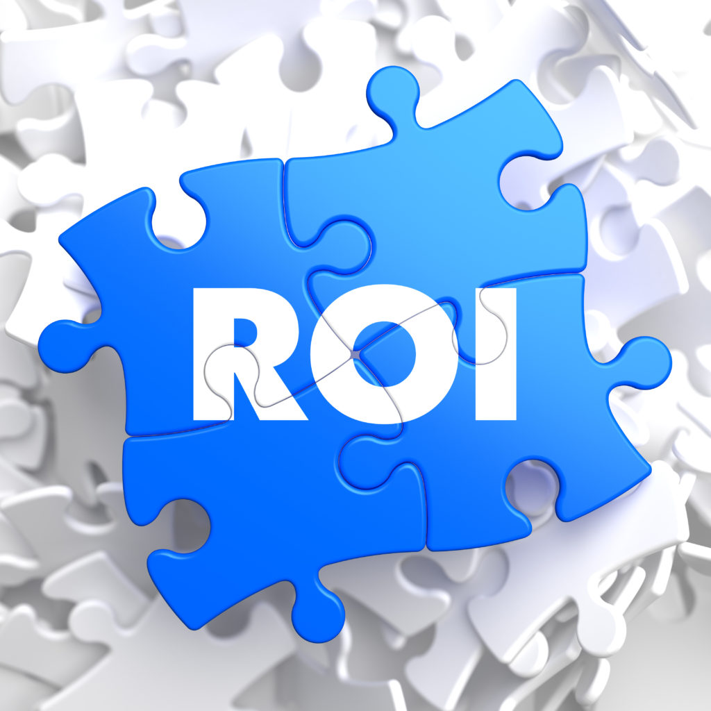 ROI on Blue Puzzle Pieces. Business Concept.